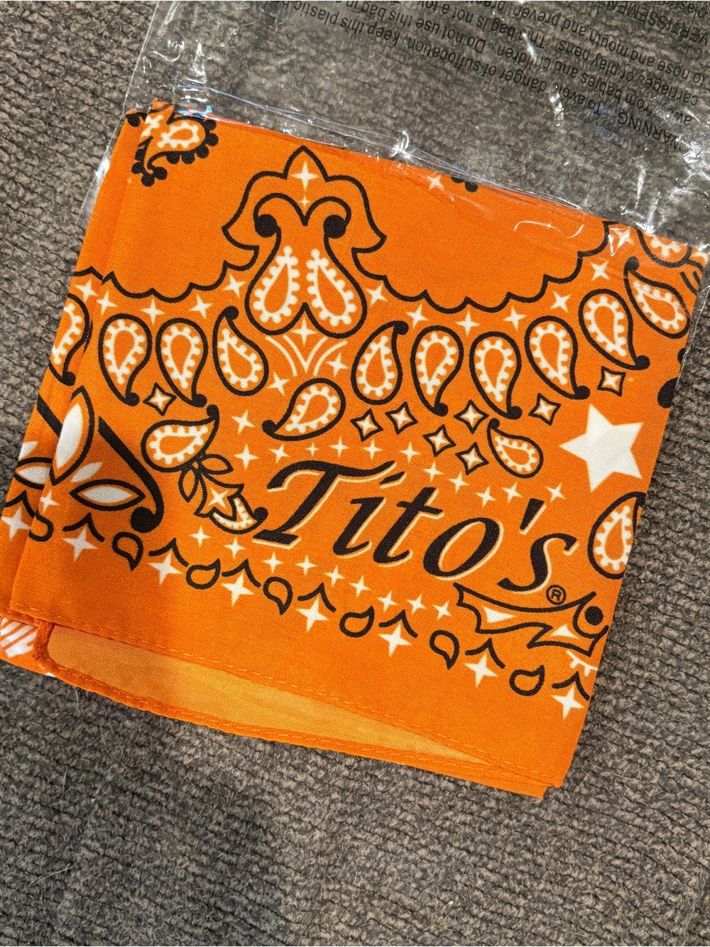 Orange Paisley Tito’s Bandana product merch